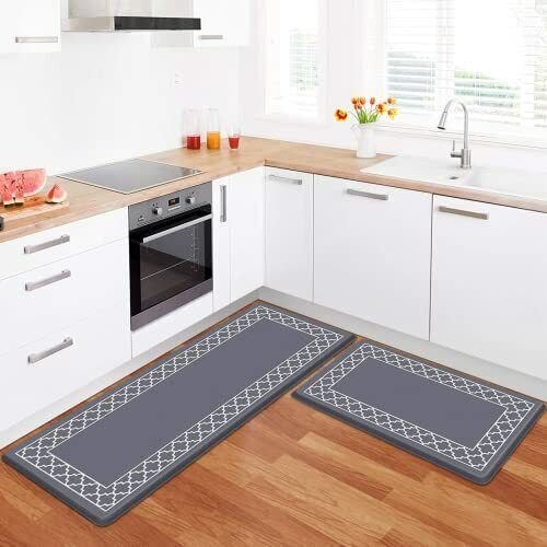 Modern kitchen with grey patterned floor mats